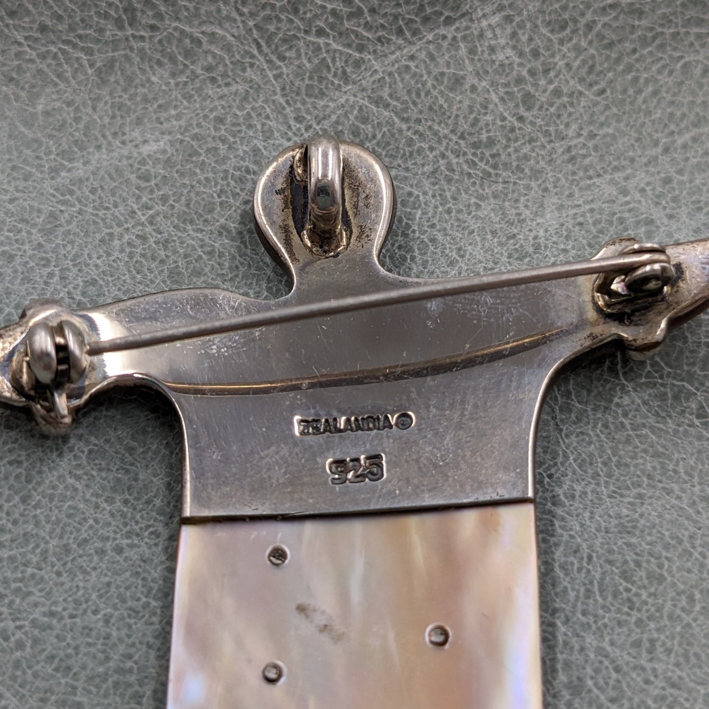 Zealandia Designs - Sterling and Mother of Pearl Figural Convertible Pendant/Brooch