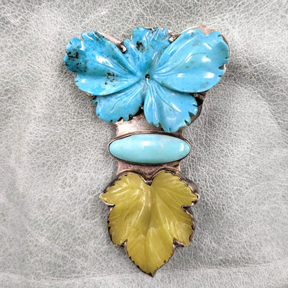 Amy Kahn Russell - Carved Turquoise Flower, Jade (?) Leaf, and Sterling Convertible Pendant/Brooch