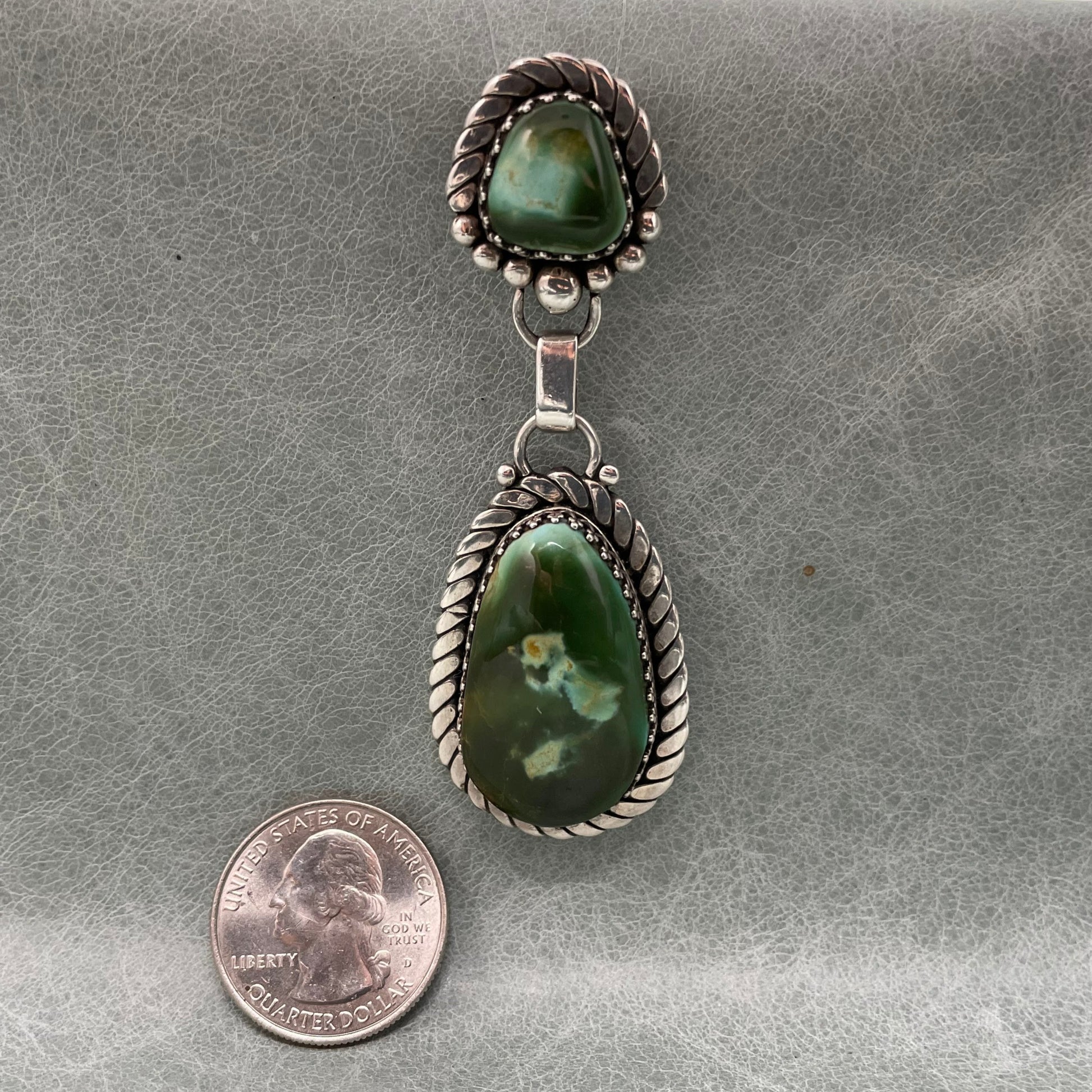 3 inch Sterling Silver pendant set with two stunning Royston Turquoise stones by Anglo artisan John Hartman of Durango Silver Company