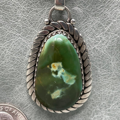 3 inch Sterling Silver pendant set with two stunning Royston Turquoise stones by Anglo artisan John Hartman of Durango Silver Company - bottom stone close up