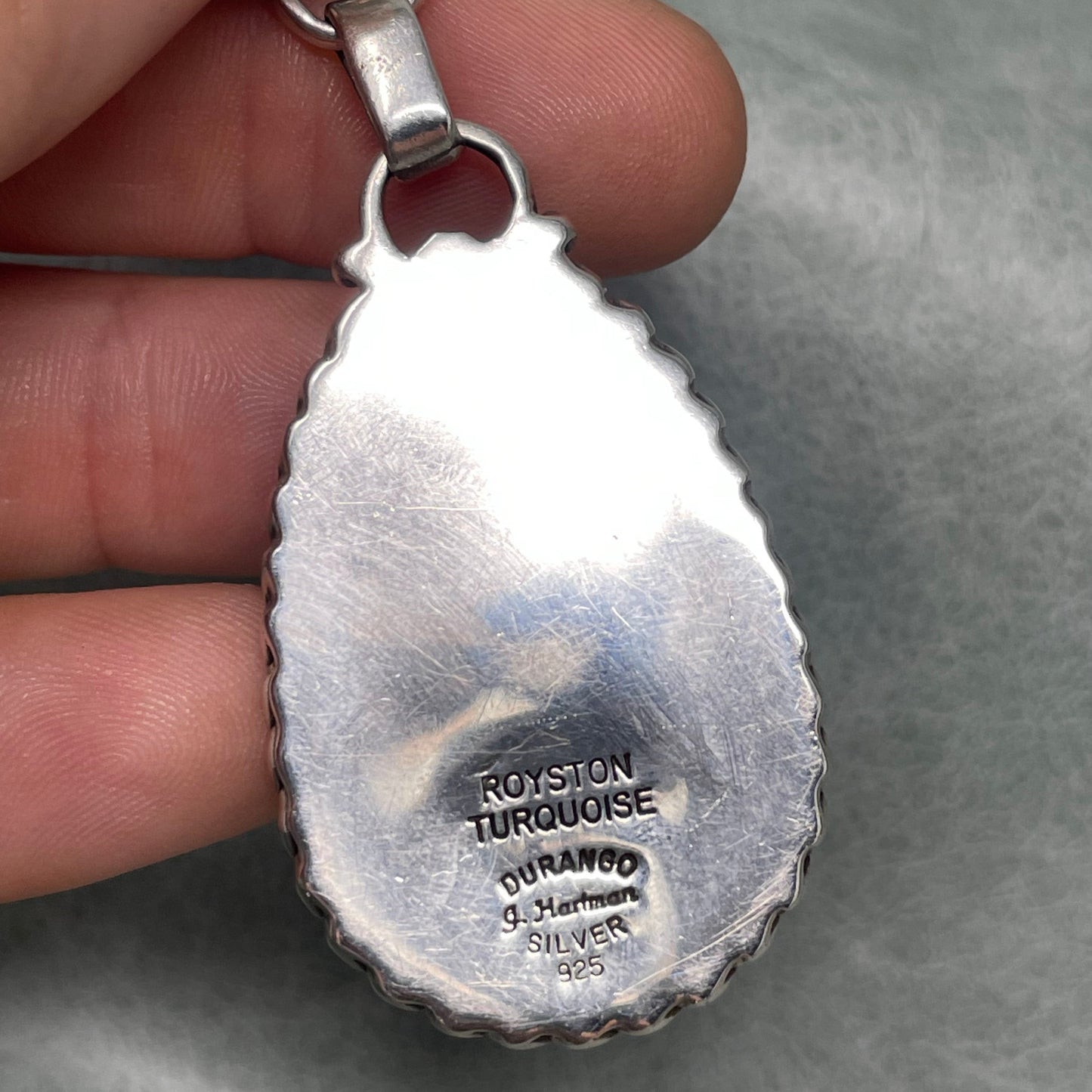 3 inch Sterling Silver pendant set with two stunning Royston Turquoise stones by Anglo artisan John Hartman of Durango Silver Company - back view with artist's mark
